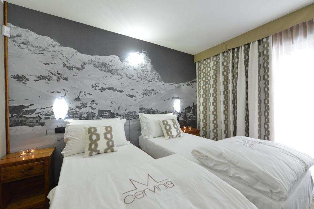 Łóżko lub łóżka w pokoju w obiekcie Mollino Rooms