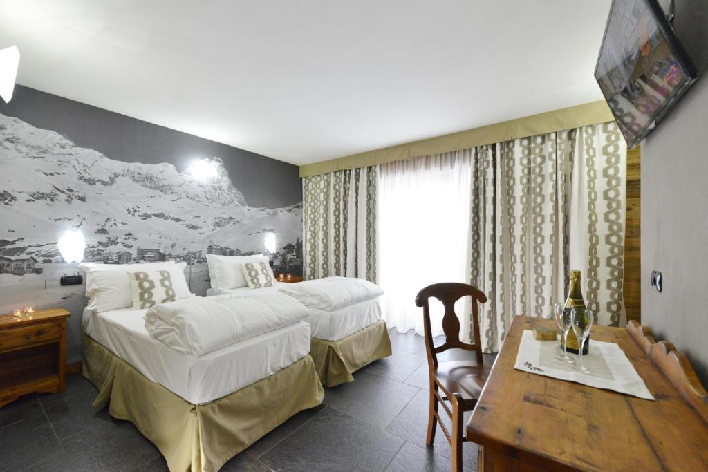 Łóżko lub łóżka w pokoju w obiekcie Mollino Rooms