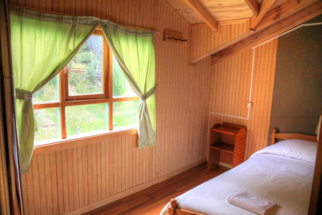 Cama o camas de una habitación en Turismo Rural Los Alpes