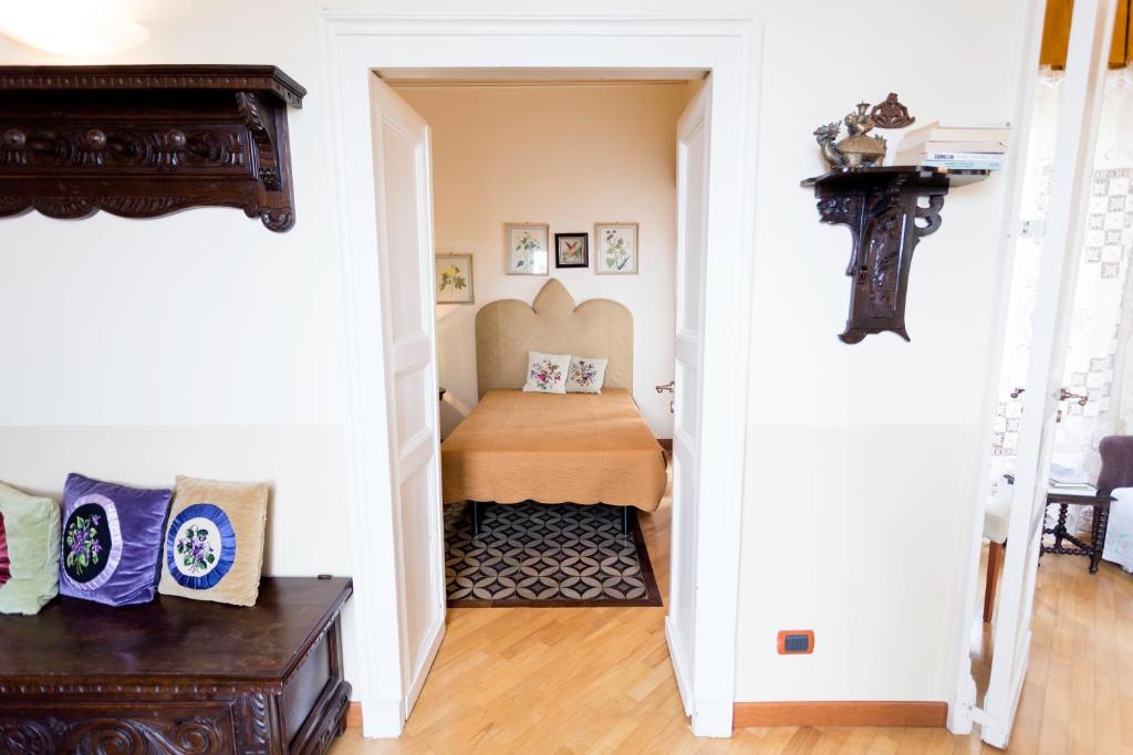 Posteľ alebo postele v izbe v ubytovaní Crociferi B&B