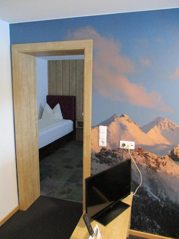 Posteľ alebo postele v izbe v ubytovaní Aparthotel Garni Schranz