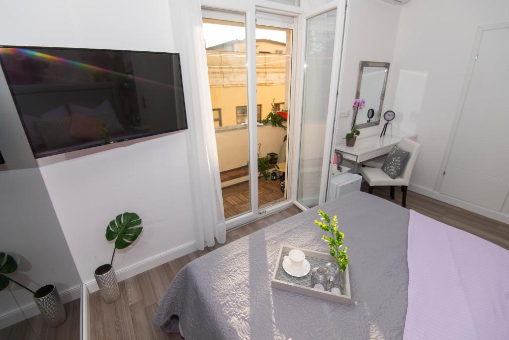 Televízia a/alebo spoločenská miestnosť v ubytovaní Guest house Lenny rooms