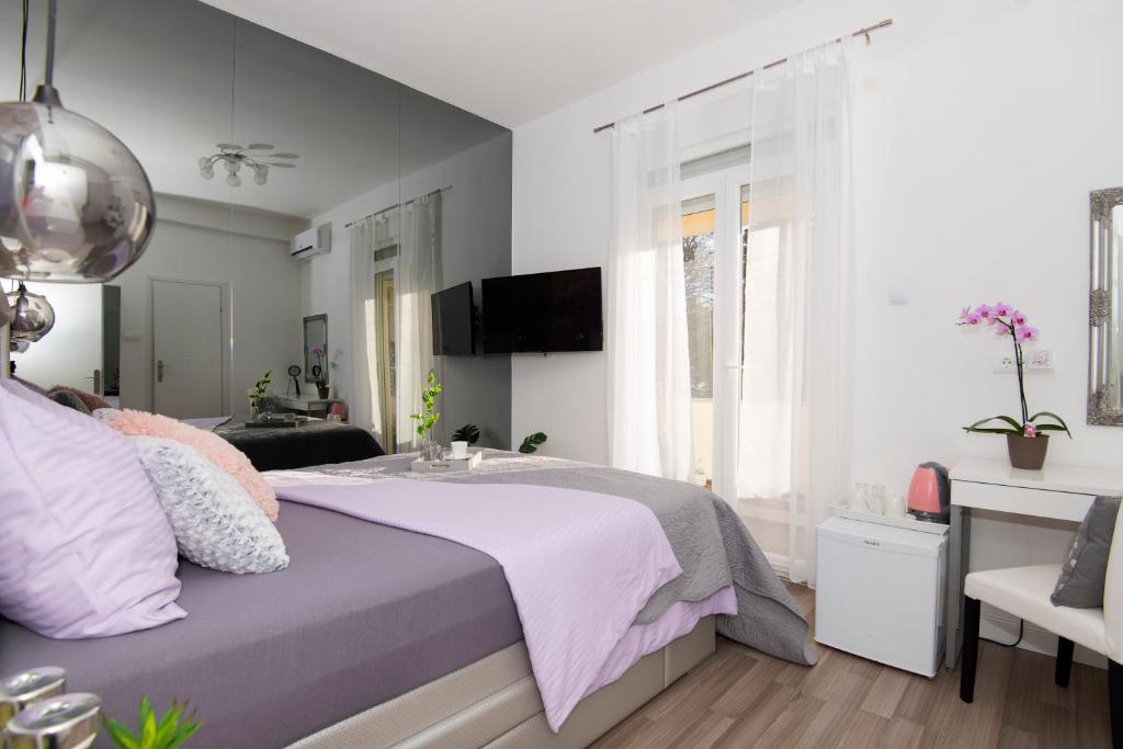 Posteľ alebo postele v izbe v ubytovaní Guest house Lenny rooms