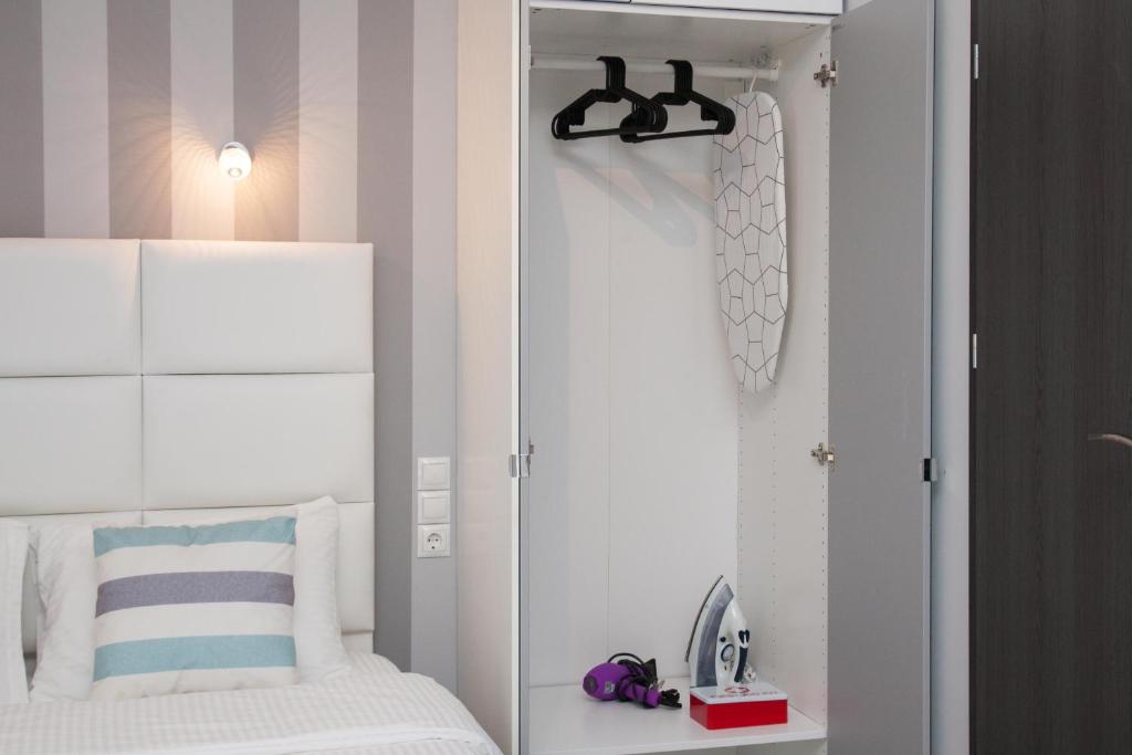 Posteľ alebo postele v izbe v ubytovaní Walk to Markets from a Cozy Studio by Cielo Homes