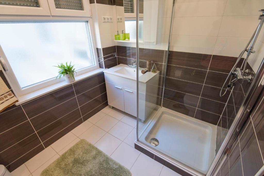 Kúpeľňa v ubytovaní Guest house Lenny rooms