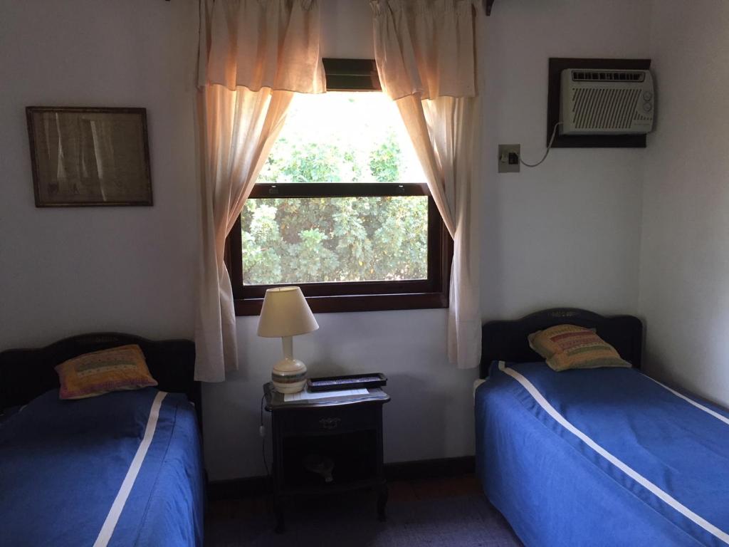 Postel nebo postele na pokoji v ubytování Pousada Fazenda Pinhalzinho