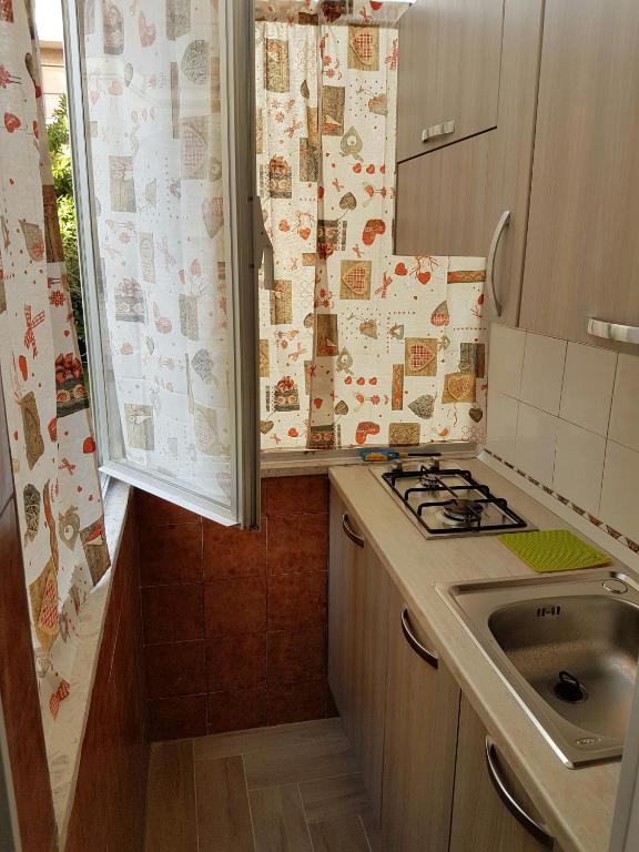 Kuchyňa alebo kuchynka v ubytovaní Casa Vittoria