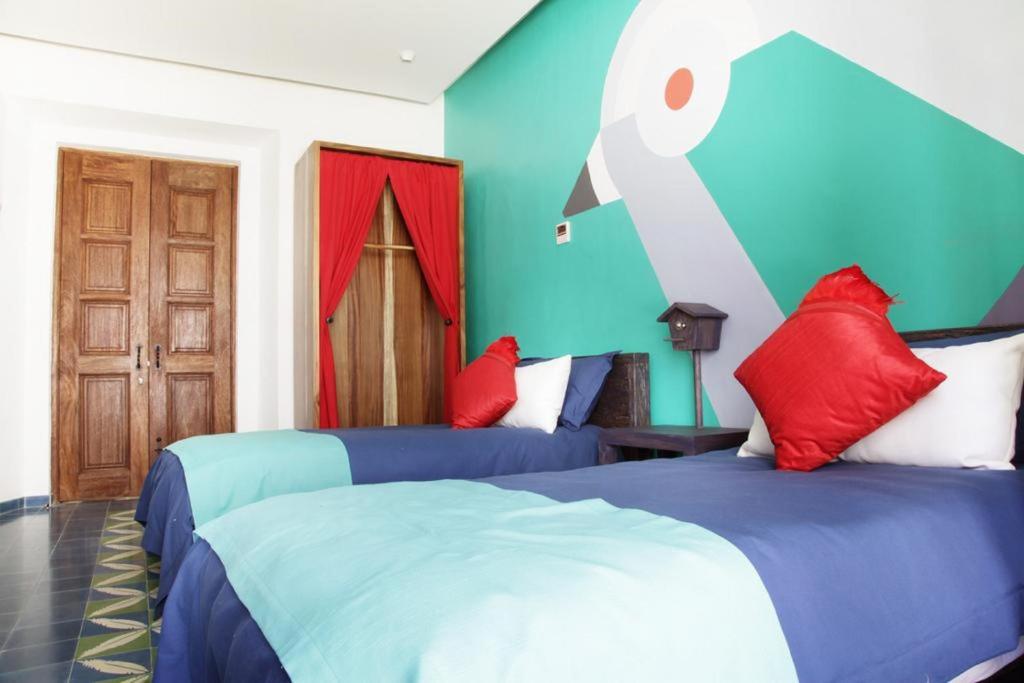 Postel nebo postele na pokoji v ubytování Del Carmen Concept Hotel Boutique by Chai