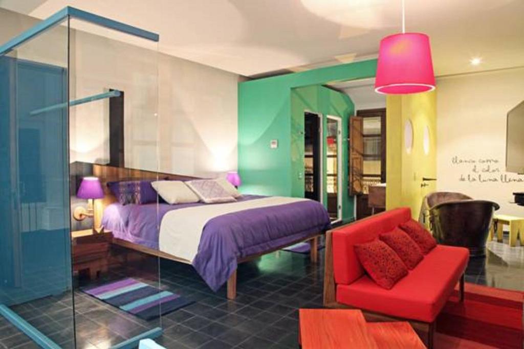 Postel nebo postele na pokoji v ubytování Del Carmen Concept Hotel Boutique by Chai