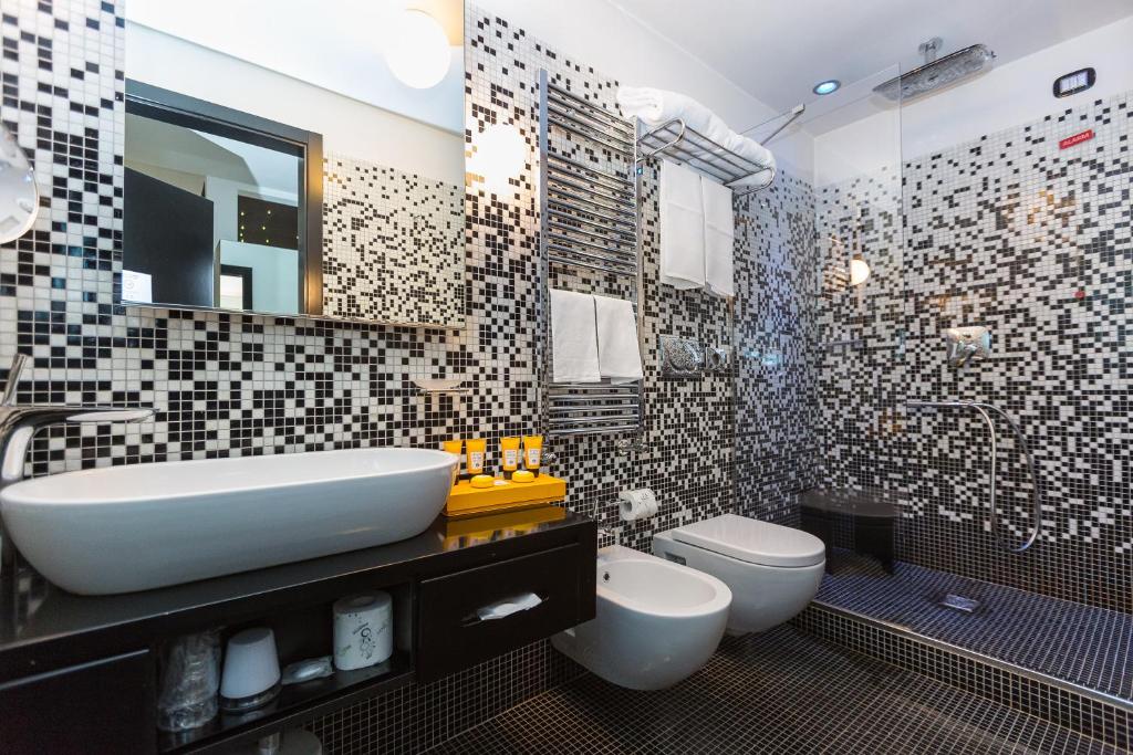 Koupelna v ubytování JC Hotel
