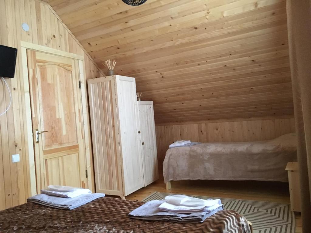 Postel nebo postele na pokoji v ubytování Cottage Marko