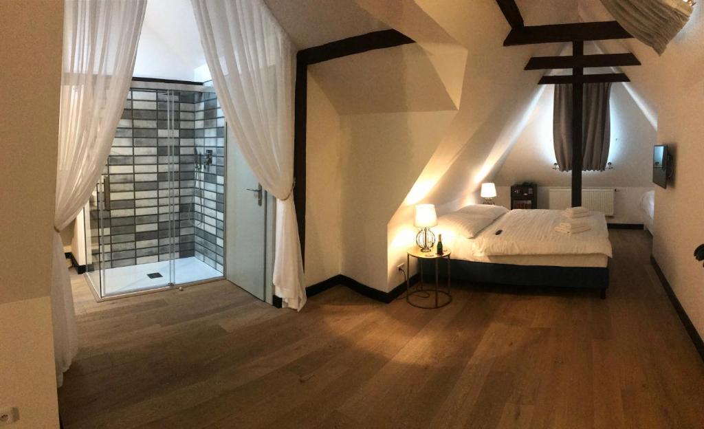 Postel nebo postele na pokoji v ubytování Antik Hotel Prague