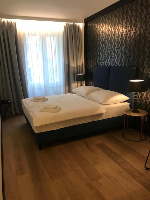 Postel nebo postele na pokoji v ubytování Antik Hotel Prague