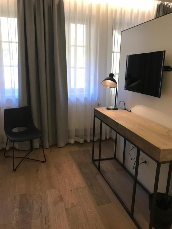 TV a/nebo společenská místnost v ubytování Antik Hotel Prague