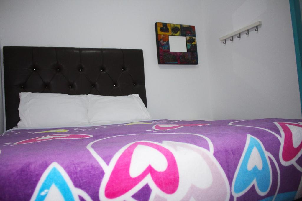 Postel nebo postele na pokoji v ubytování Hostal Johnnier Macao Punta Cana