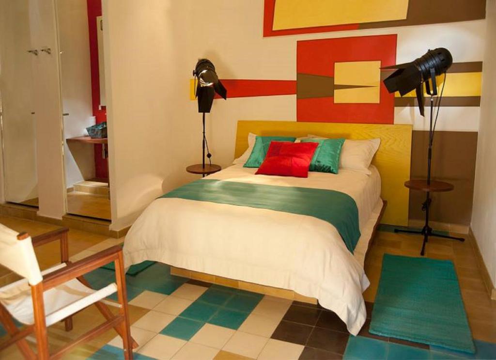 Postel nebo postele na pokoji v ubytování Del Carmen Concept Hotel Boutique by Chai
