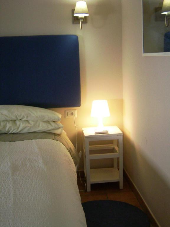 Postel nebo postele na pokoji v ubytování Al Terrazzo
