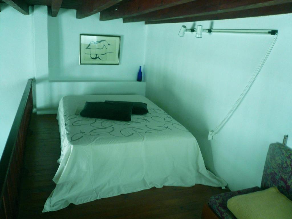 Postel nebo postele na pokoji v ubytování La Finca Uga