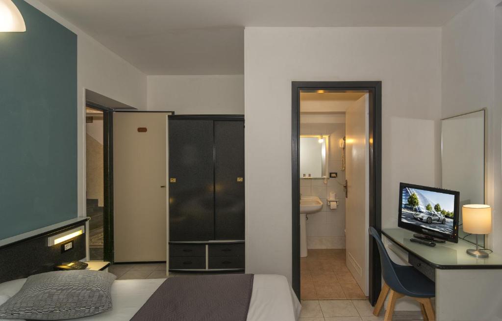 TV a/nebo společenská místnost v ubytování Hotel Amalfitana