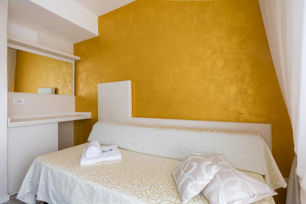 Postel nebo postele na pokoji v ubytování Hotel Ca' Di Valle