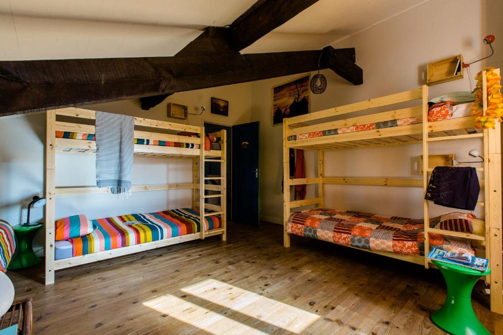 Postel nebo postele na pokoji v ubytování Nami House
