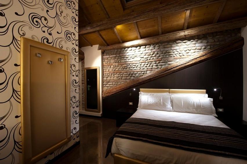 Postel nebo postele na pokoji v ubytování Villa Solaris Hotel & Residence