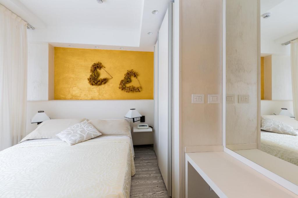 Postel nebo postele na pokoji v ubytování Hotel Ca' Di Valle