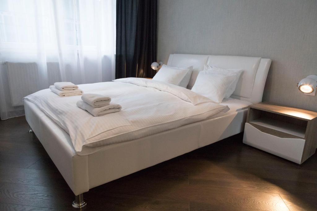 Posteľ alebo postele v izbe v ubytovaní Apartament Moniuszki by Your Freedom