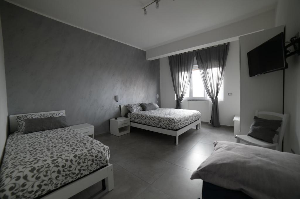Postel nebo postele na pokoji v ubytování SaMi B&B