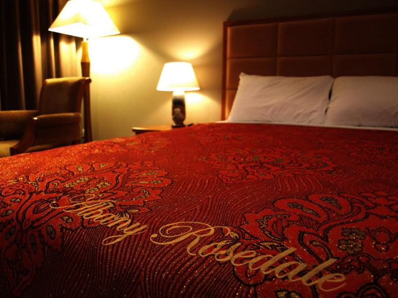 Postel nebo postele na pokoji v ubytování Albany Rosedale Motel