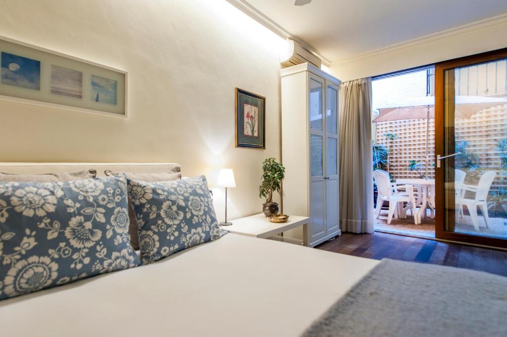 
Cama o camas de una habitación en Alterhome Puerta del Sol II
