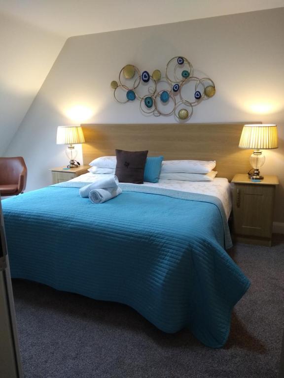 Cama o camas de una habitación en Tollyrose Country House