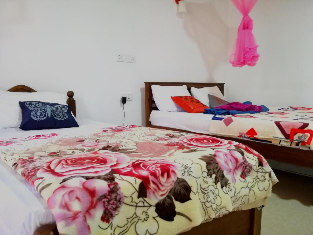 Postel nebo postele na pokoji v ubytování Ella Sunrise
