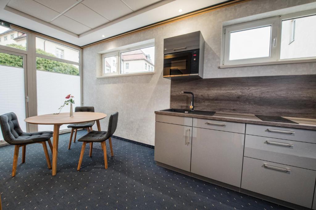 Kuchyň nebo kuchyňský kout v ubytování Göbel's Sophien Hotel