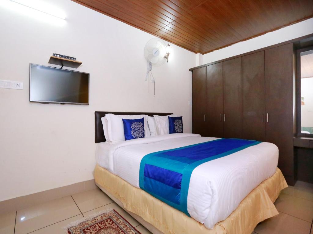 Postel nebo postele na pokoji v ubytování Sophiya Suites