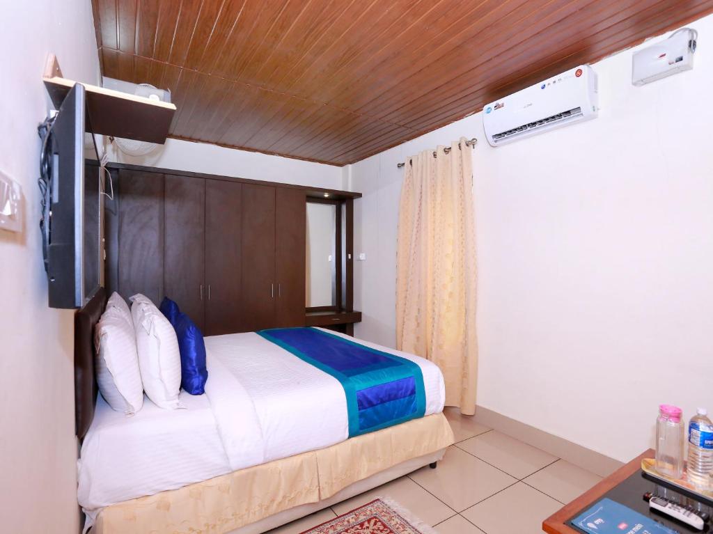 Postel nebo postele na pokoji v ubytování Sophiya Suites