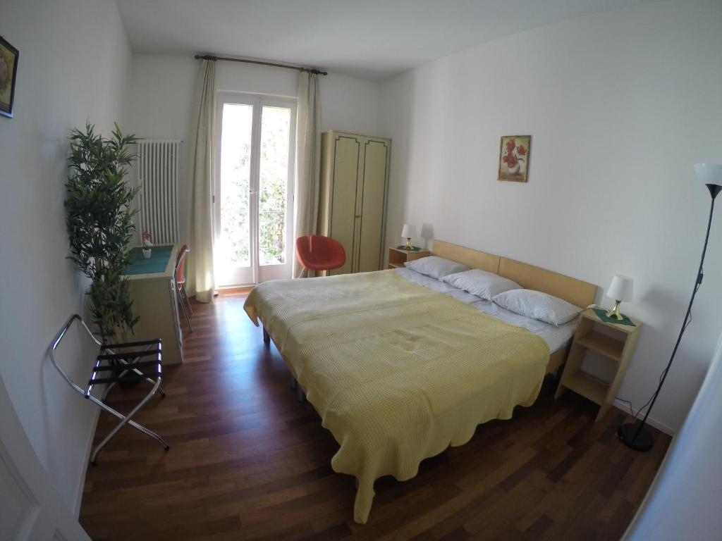 Postel nebo postele na pokoji v ubytování Rooms Al Festival
