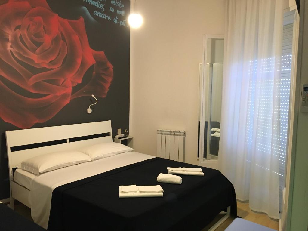 Postel nebo postele na pokoji v ubytování X Hotel