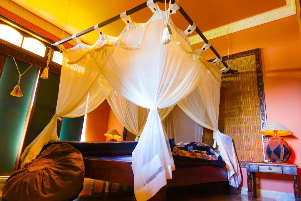 Postel nebo postele na pokoji v ubytování Medana Resort Lombok