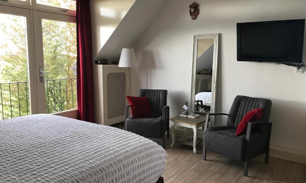 Postel nebo postele na pokoji v ubytování B&B Landleven