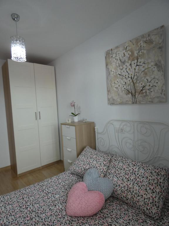 Postel nebo postele na pokoji v ubytování Bay Home