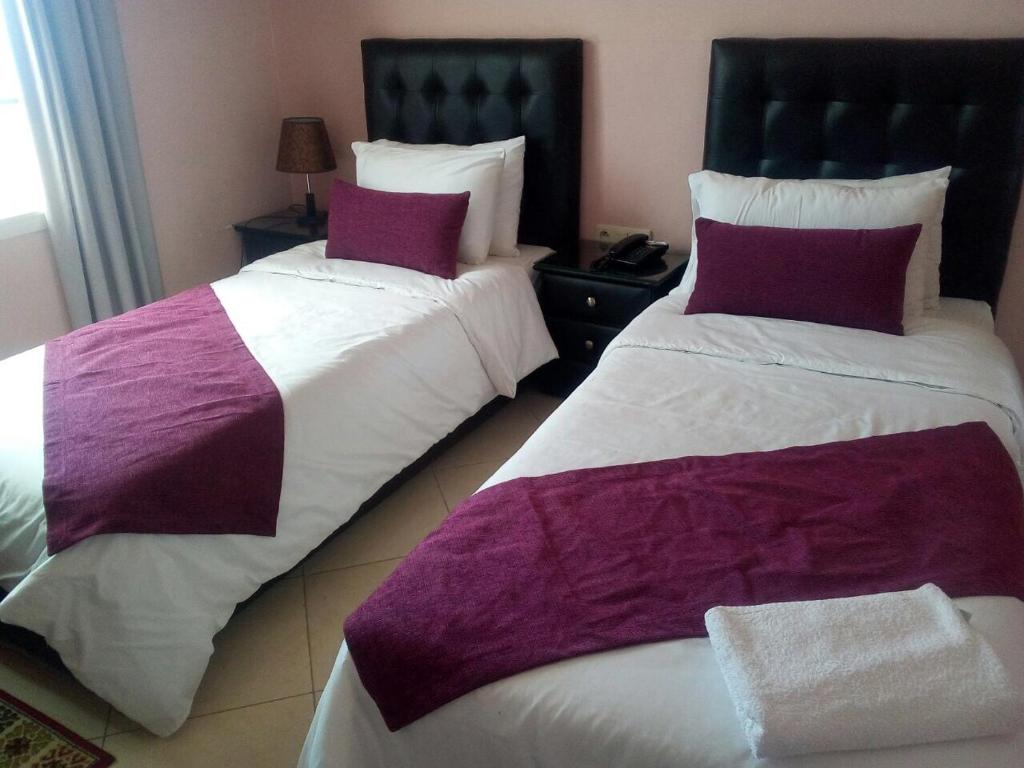 Postel nebo postele na pokoji v ubytování Hotel Miramar