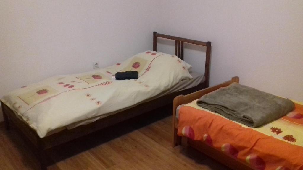 Postel nebo postele na pokoji v ubytování Apartment Green Valley