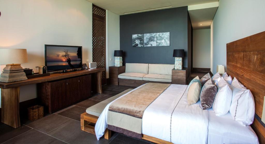 Postel nebo postele na pokoji v ubytování NIZUC Resort & Spa