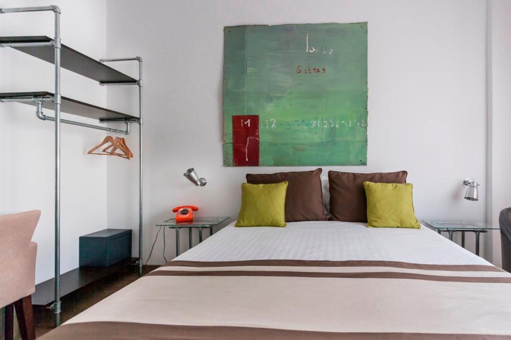Uma cama ou camas num quarto em Hotel Umu