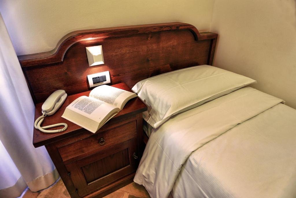 Postel nebo postele na pokoji v ubytování Casa I Cappuccini