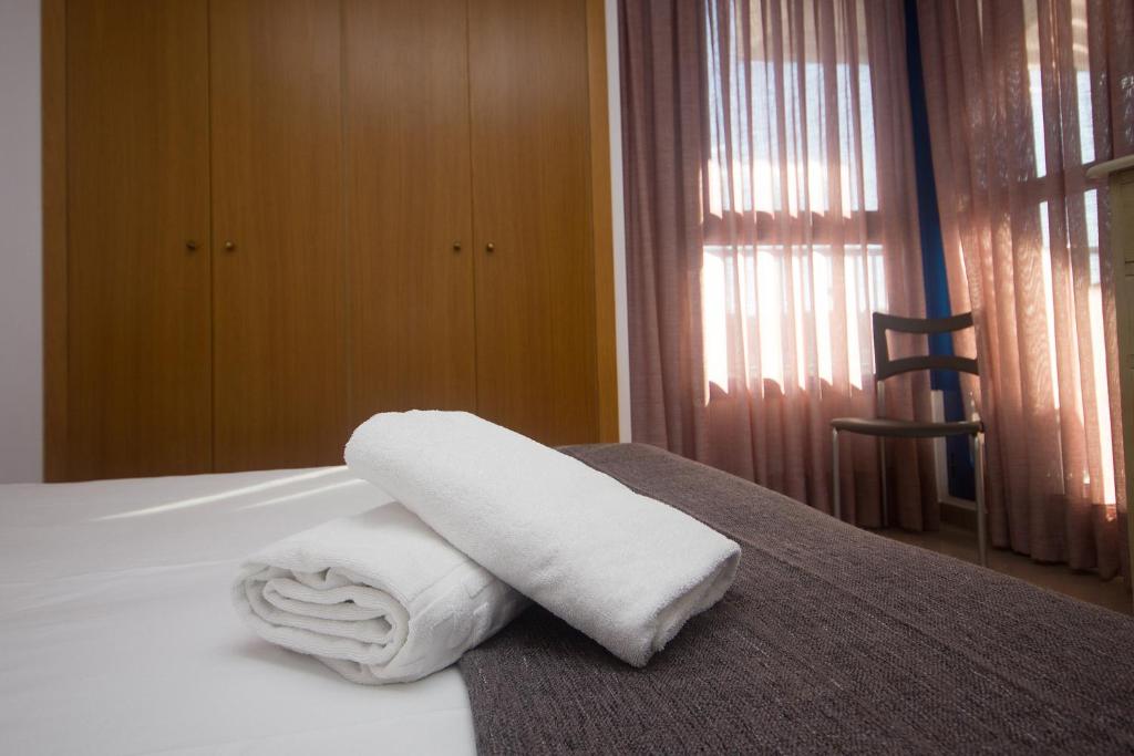 Postel nebo postele na pokoji v ubytování Style Apartment Patacona Beach