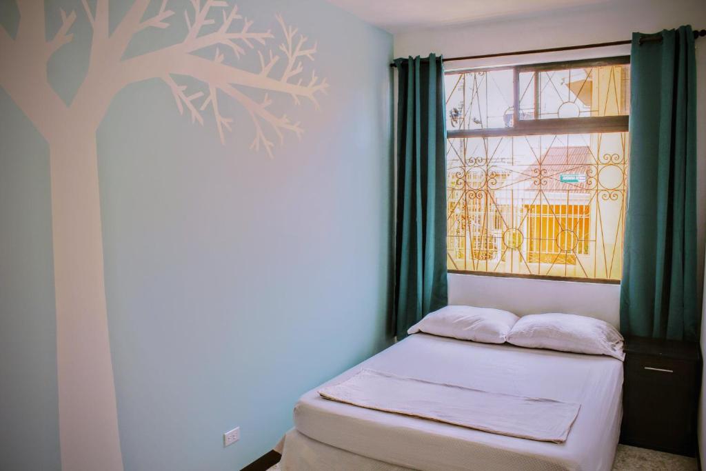 Postel nebo postele na pokoji v ubytování Stray Cat Hostel