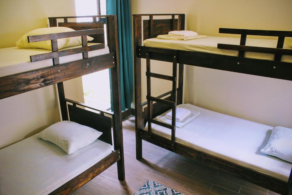 Postel nebo postele na pokoji v ubytování Stray Cat Hostel