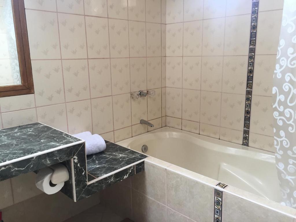 Koupelna v ubytování Hotel Pisonay Pueblo